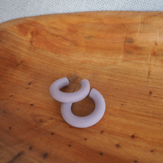 small lavender hoops on wood background